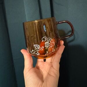 Vintage Amber Glass Mug with Cartoon Design